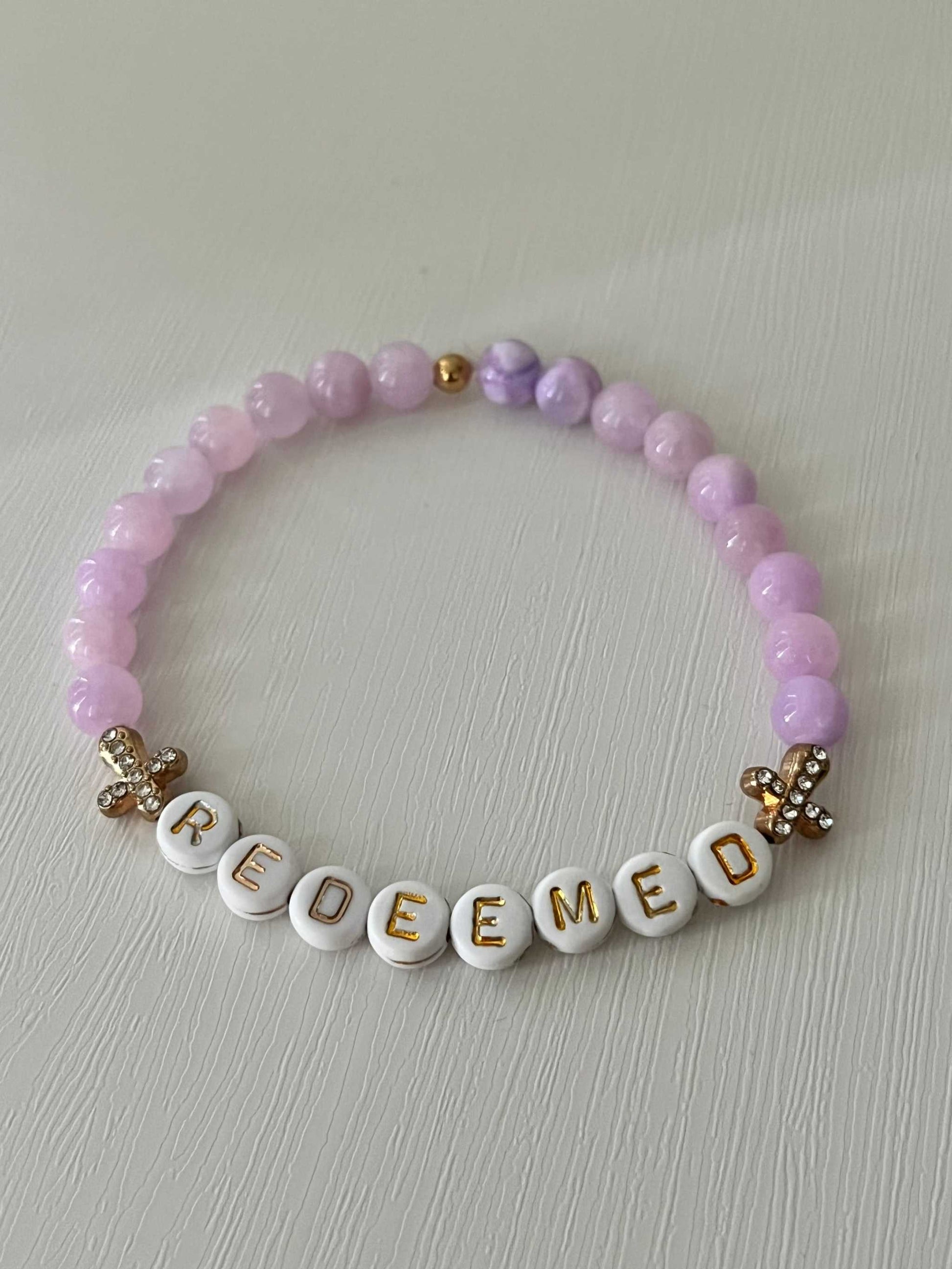 Redeemed Lavender Bead Bracelet – elegant faith jewelry with lavender glass stones.

