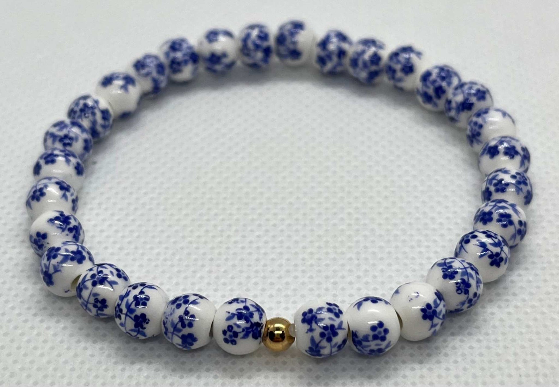 Beaded Bracelet with blue floral beads and stretchy fit, perfect for everyday wear

