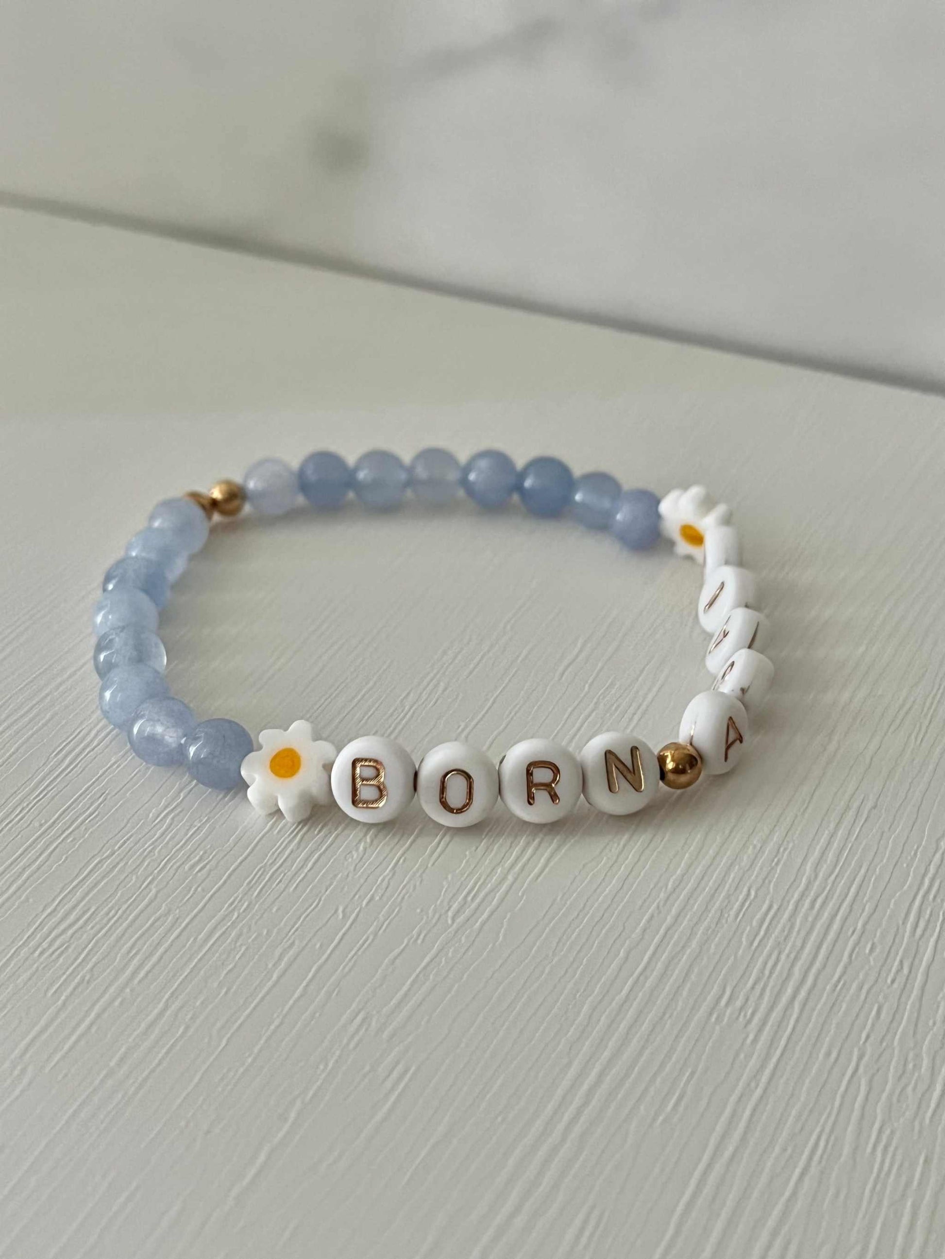 Sky Blue Born Again Bracelet showcasing vibrant blue beads, ideal for expressing faith and celebrating new beginnings in your spiritual journey.
