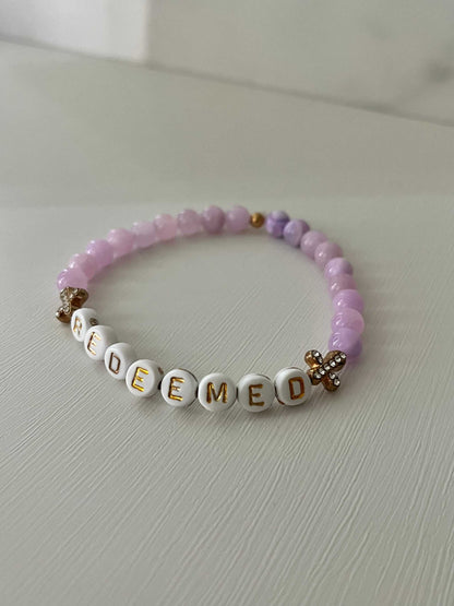Redeemed Lavender Bead Bracelet – elegant faith jewelry with lavender glass stones.

