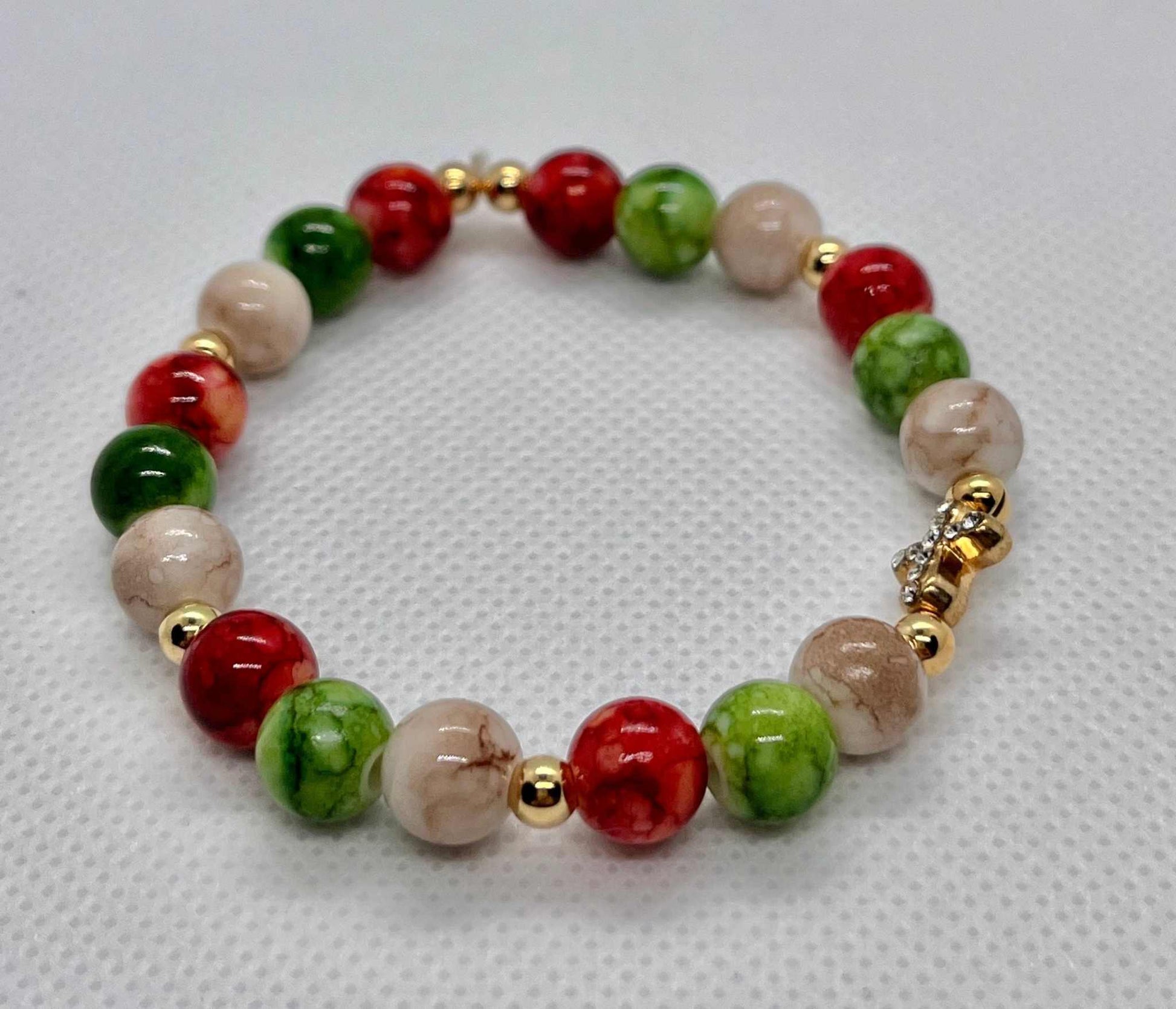 Jeweled Christmas Gold Cross bead bracelet – festive Christian holiday jewelry.

