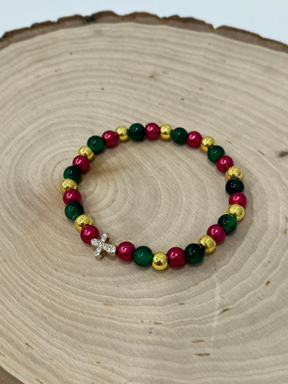 Gold beaded Christmas cross bracelet with jeweled cross charm