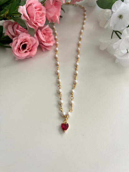 Gold heart necklace with freshwater pearl and 18K gold heart pendant on 18-inch hypoallergenic chain