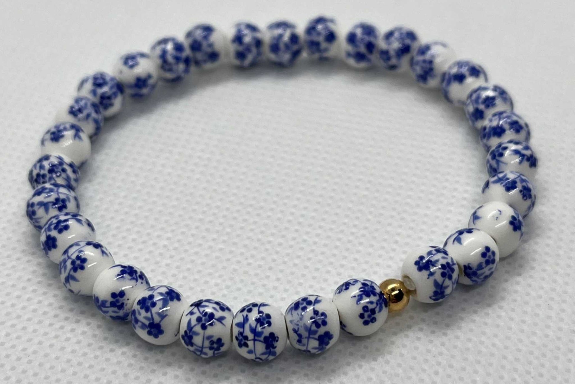 Beaded Bracelet with blue floral beads and stretchy fit, perfect for everyday wear

