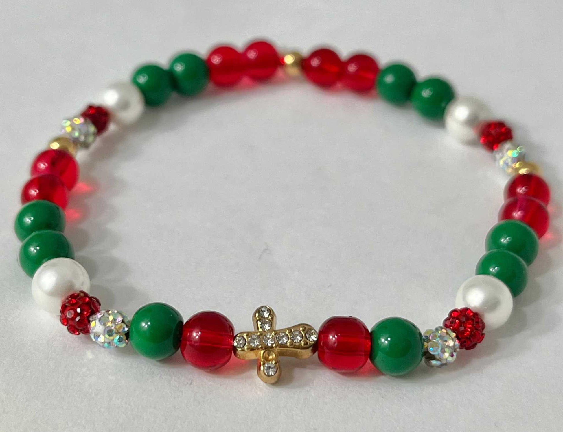 Jeweled Christmas Gold Cross bead bracelet – festive Christian holiday jewelry.

