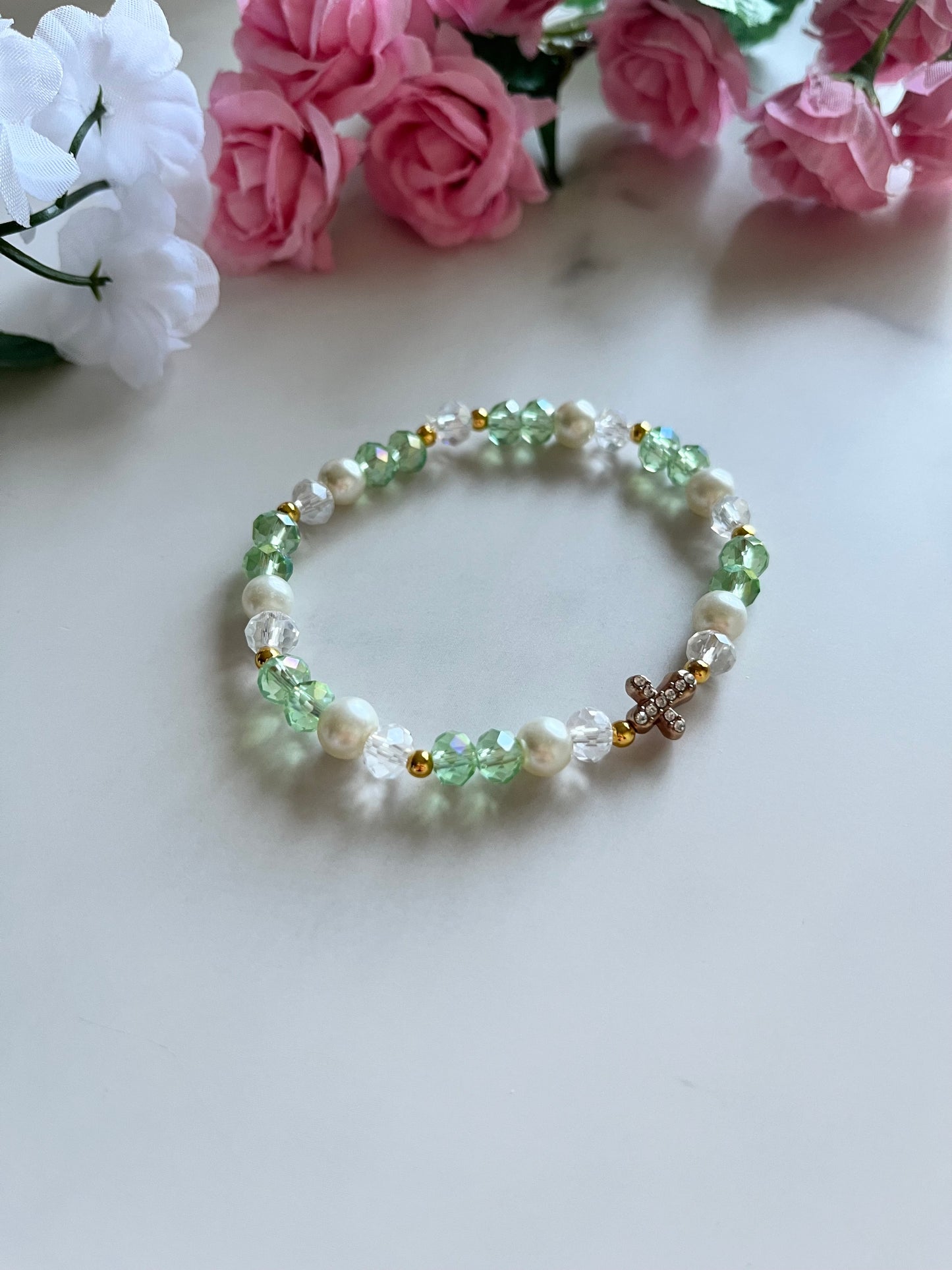 Pearl cross bracelet with gold charm and faux pearl beads