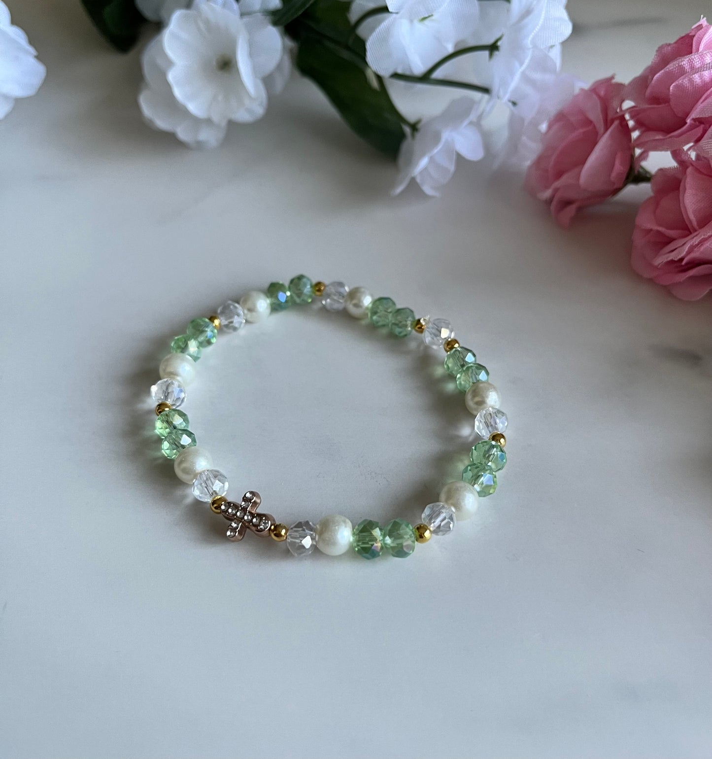 Pearl cross bracelet with gold charm and faux pearl beads