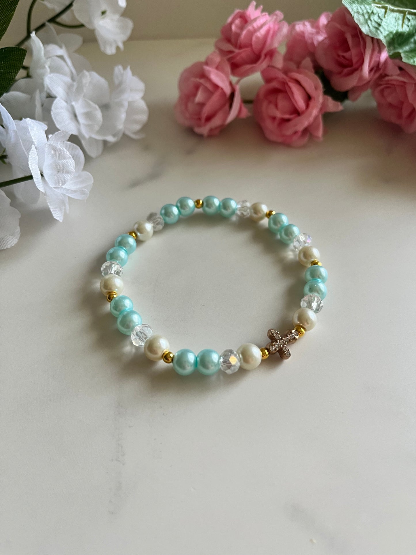 Pearl cross bracelet with gold charm and faux pearl beads