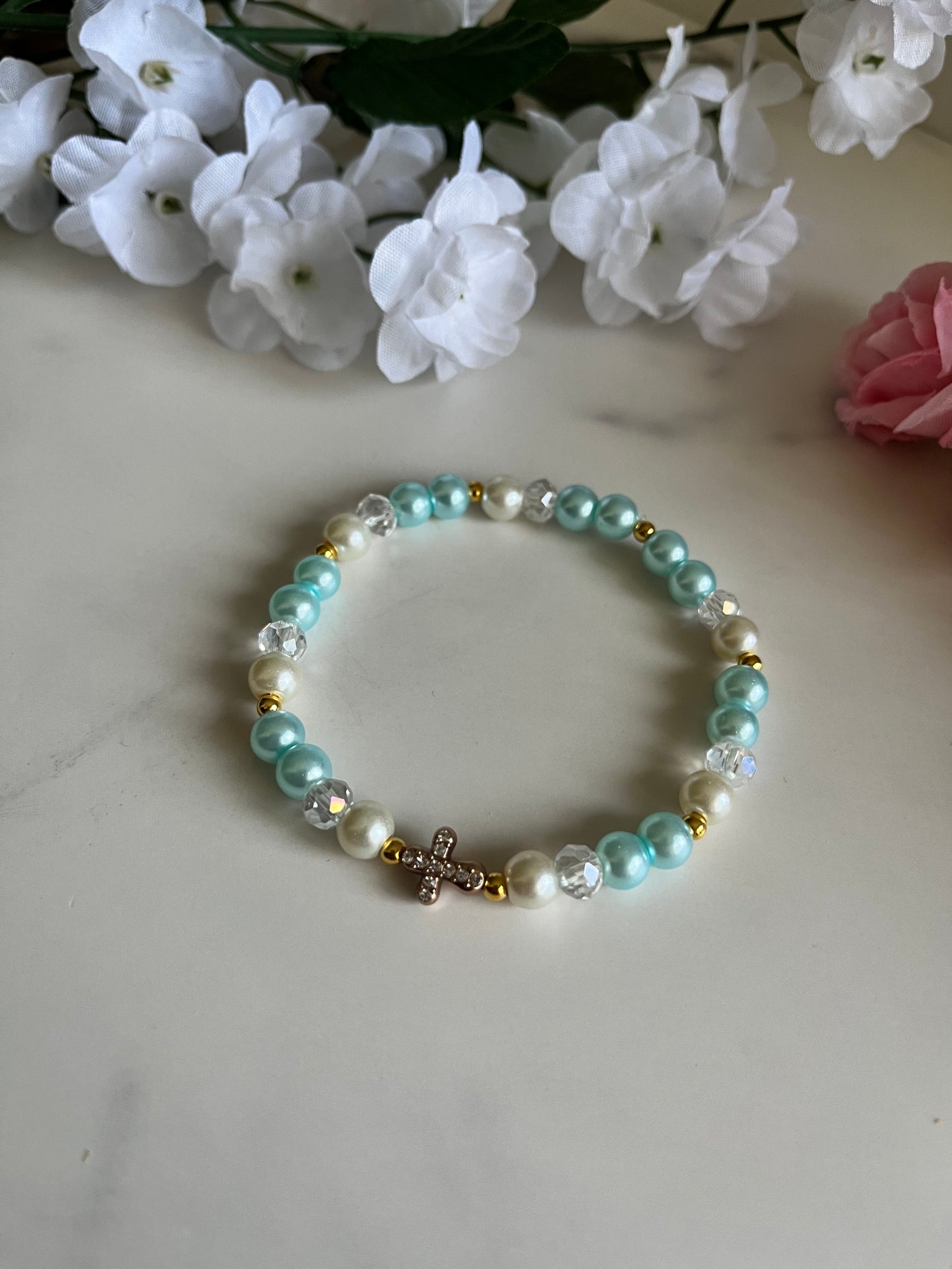 Pearl cross bracelet with gold charm and faux pearl beads
